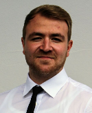 This image shows Dr. Andreas Schneider